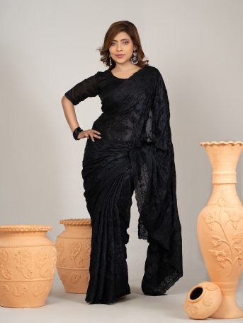 ইমপোর্টেড ব্ল্যাক কালার ওয়েটলেস সফট চিনিগুড়া সিল্ক ফেব্রিক এর মধ্যে গর্জিয়াস এমব্রয়ডারি কাজ করা পার্টি শাড়ি।