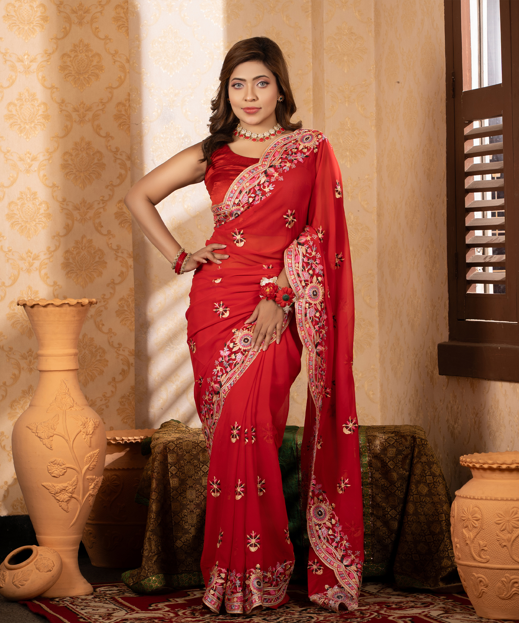 ইমপোর্টেড রেড কালার ওয়েটলেস সফট জর্জেট ফেব্রিক এর মধ্যে গর্জিয়াস এমব্রয়ডারি কাজ করা পার্টি শাড়ি