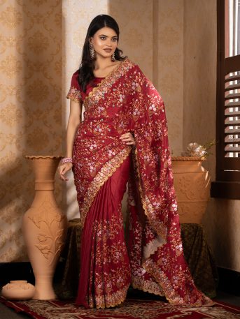 ইমপোর্টেড মেরুন কালার ওয়েটলেস সফট চিনিগুড়া সিল্ক ফেব্রিক এর মধ্যে গর্জিয়াস এমব্রয়ডারি কাজ করা পার্টি শাড়ি।